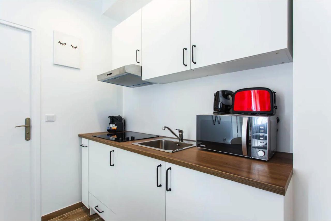 Appartamento Cmg Place De Clichy - Metro Europe Parigi Esterno foto