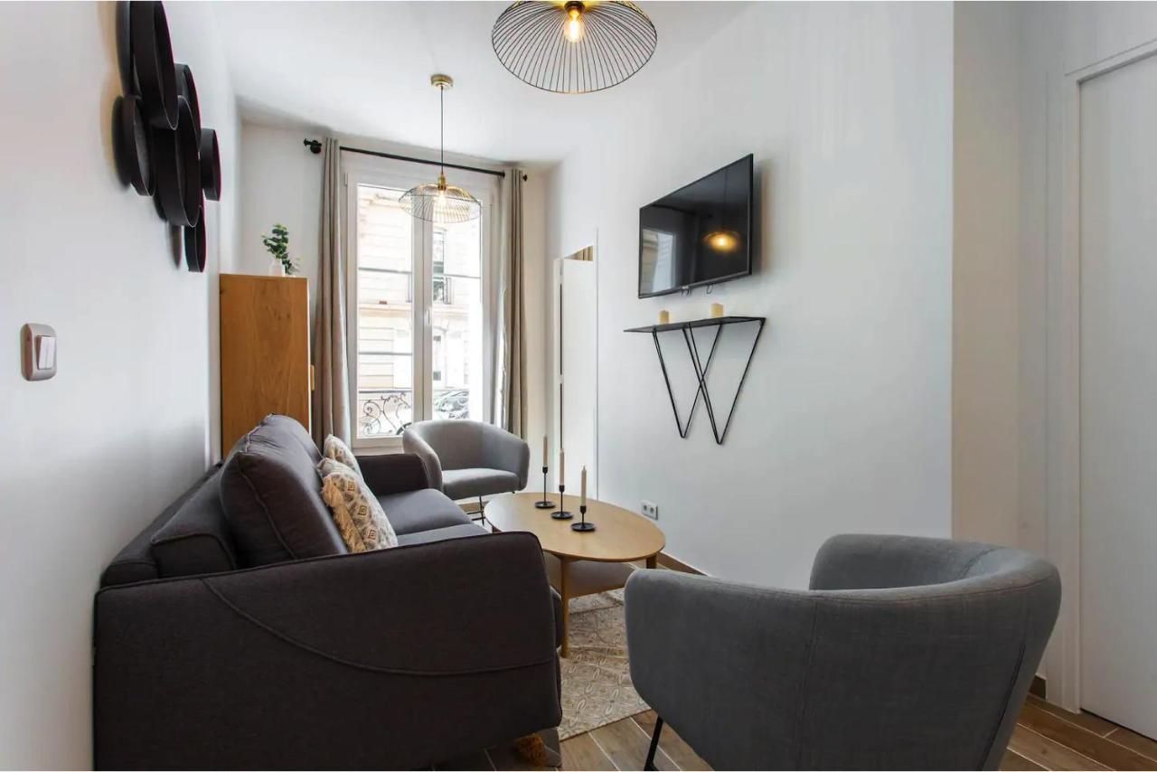 Appartamento Cmg Place De Clichy - Metro Europe Parigi Esterno foto