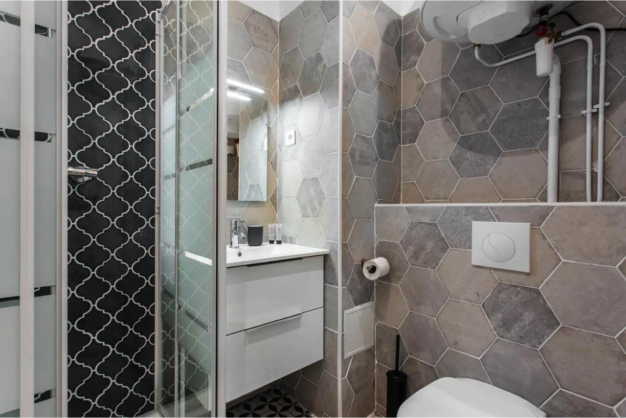 Appartamento Cmg Place De Clichy - Metro Europe Parigi Esterno foto