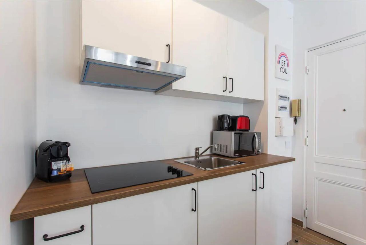 Appartamento Cmg Place De Clichy - Metro Europe Parigi Esterno foto